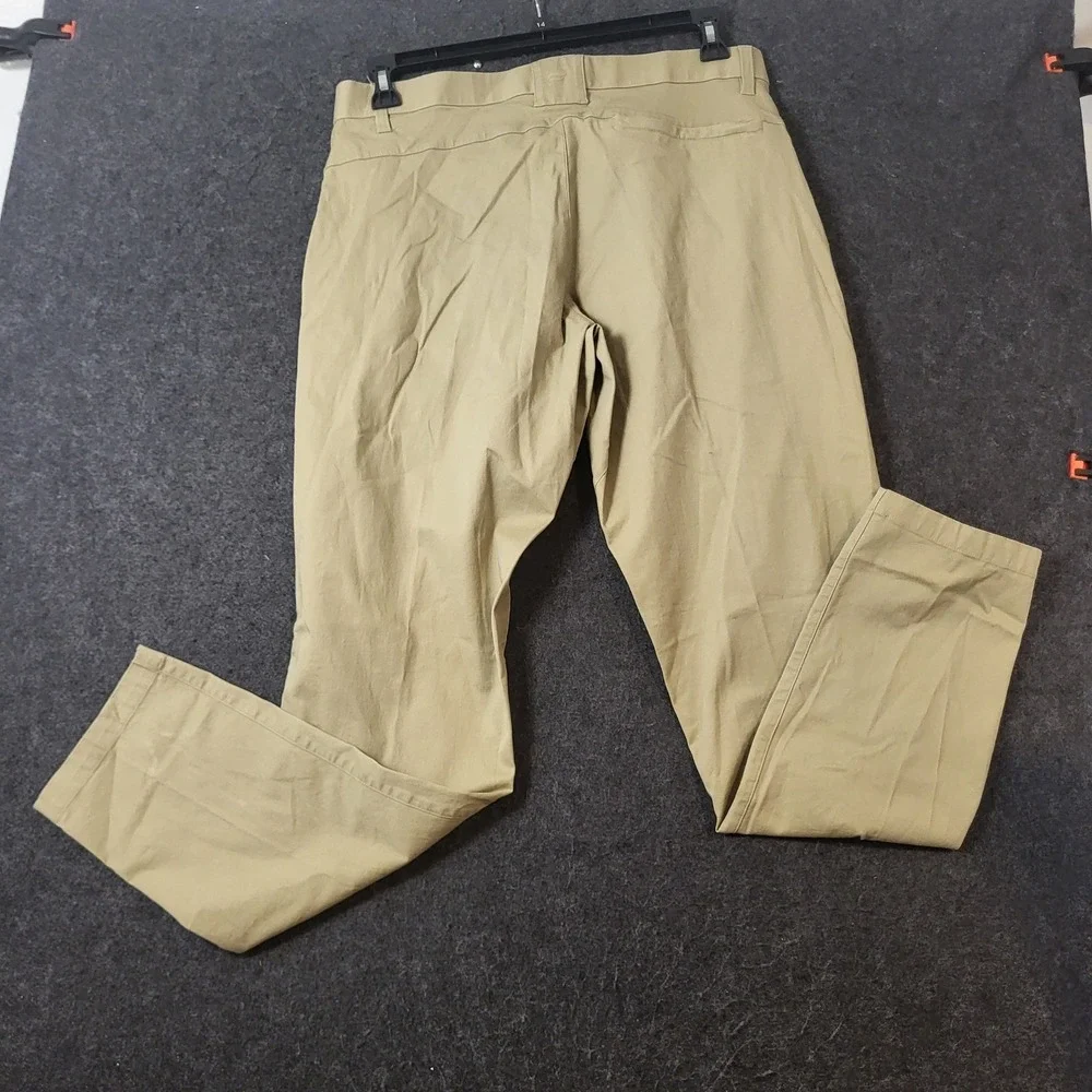 Fabletics The One Pant Mens 34x34 Khaki Tan Stretch Chino PT2354910-3487-34034